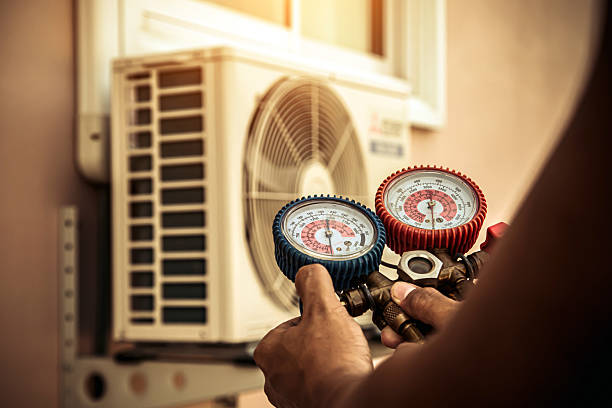 Professional Hvac technician working in Hudson, IL